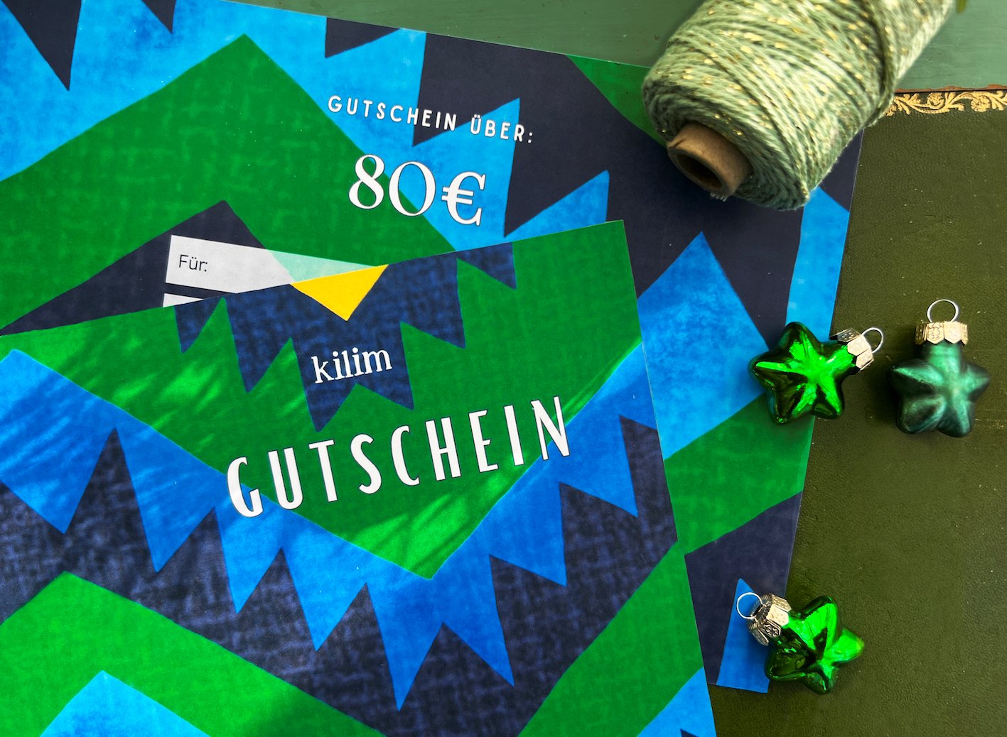 Geschenkgutschein grün (im Wert von 80 Euro und 100 Euro) - Kilim